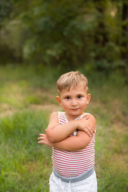 istock Boy playing outdoors 584891616