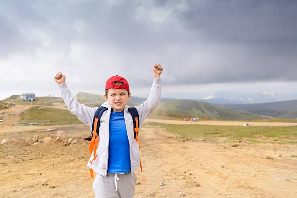 istock Happy little boy in red cap 585046668
