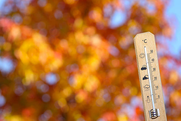 istock nice weather in the autumn shown with mercury thermometer 585048808