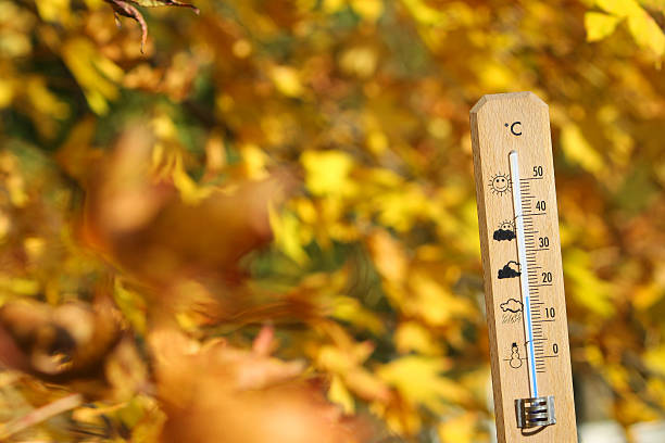 istock nice weather in the autumn shown with mercury thermometer 585049234