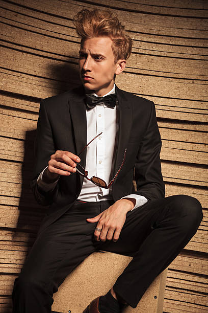 istock Thoughtful young business man looking away 585050226