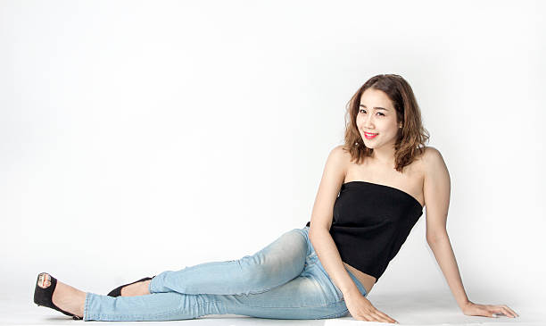 istock lady sexy post on floor 585051598