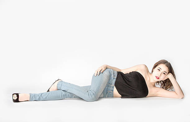 istock lady sexy post sleep one hand on floor 585051958