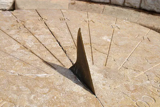 The picture was taken in Spain, in the street of the ancient city of Tarragona. Pictured Roman sundial.