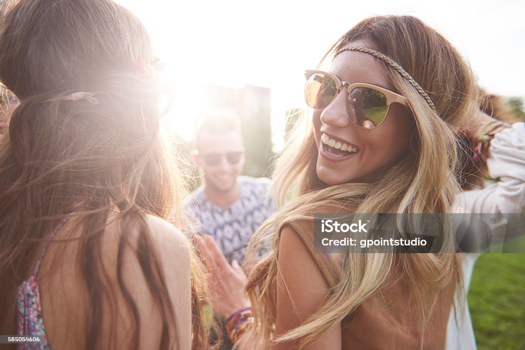 Friends dancing in the circle Music Festival Stock Photo