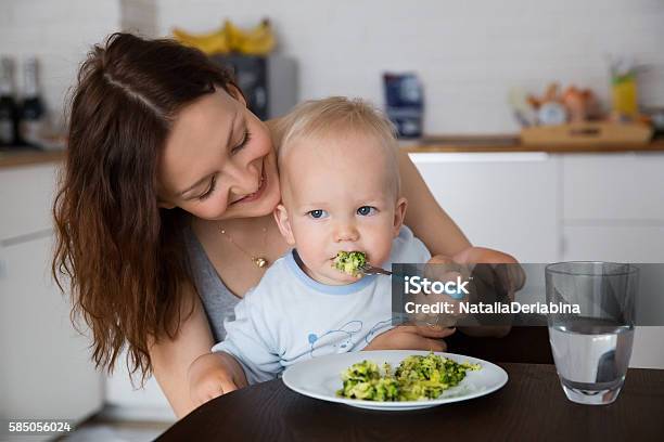 Mother And Child Eating Together Stock Photo - Download Image Now - Baby - Human Age, Food, 12-23 Months