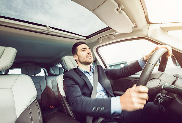 Businessman Driving the Car.
