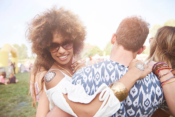 istock African descent woman turning from the crowd 585056898