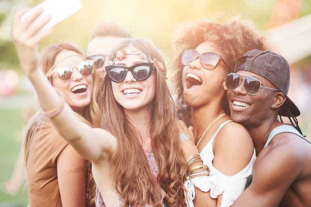 istock Group of friends taking a selfie 585057058