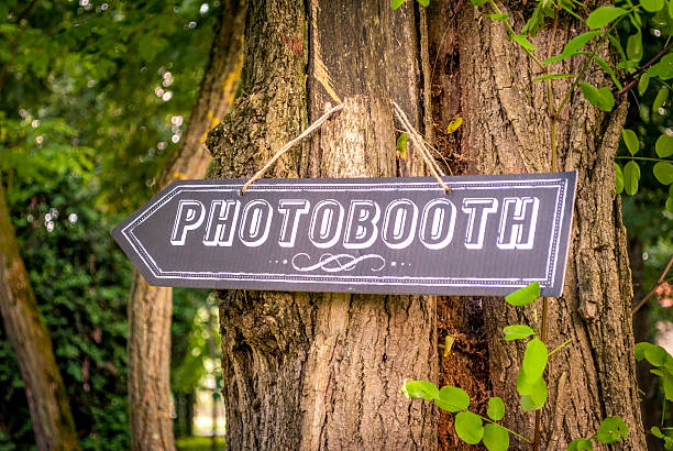 Photobooth direction at a wedding stock photo