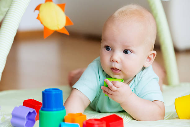 istock Baby playing and discovery 585058136