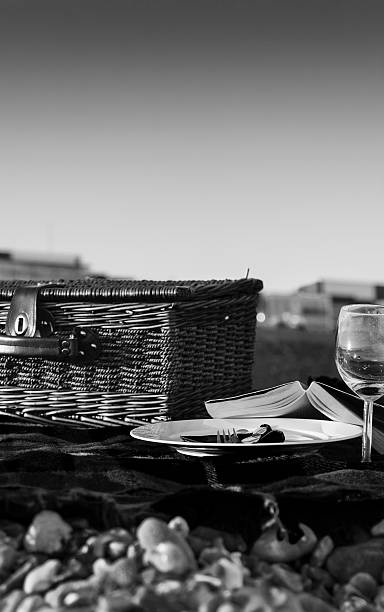 Black and white evening picnic on the beach