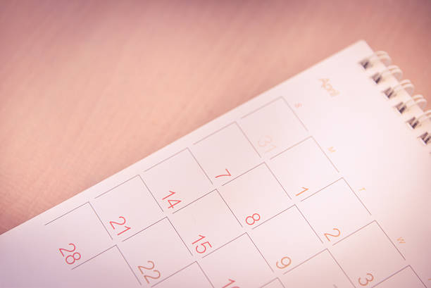 istock Blurred calendar page pink tone 585060090