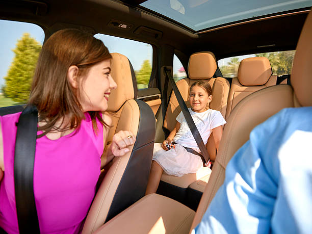 istock Happy family inside car 585061926