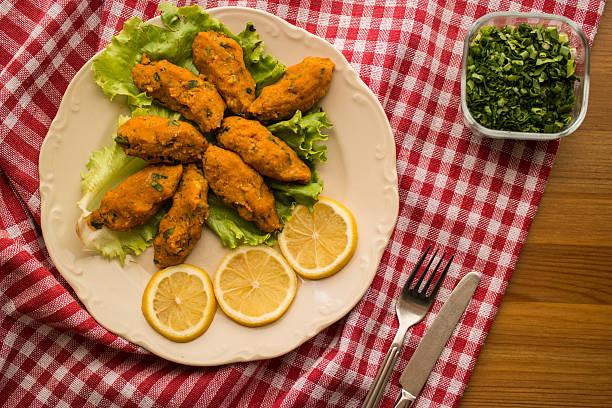 istock Mercimek Koftesi / Turkish Food with Bulgur and Lentil. 585063138