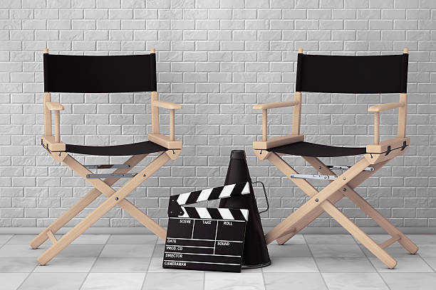 istock Director Chairs, Movie Clapper and Megaphone. 3d Rendering 585063956
