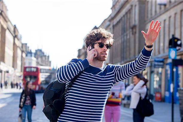 mi serve un taxi! - reaching telephone human hand caucasian foto e immagini stock