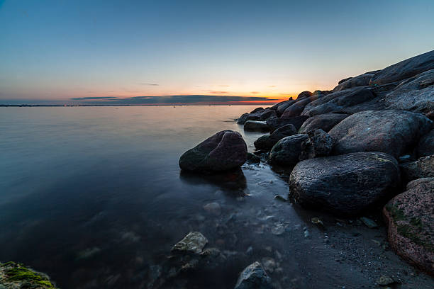 istock Calm Baltic sea seascape with rocks 585066024