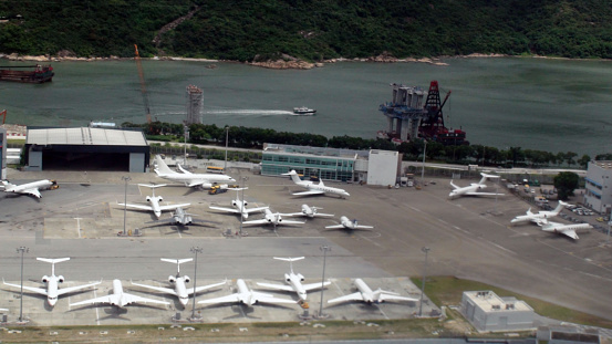 Aerial View Of Boat,Water And Airplane Parked At Hong Kong International Airport