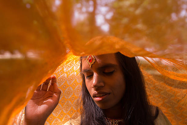 istock Young beautiful traditional indian woman 585069104
