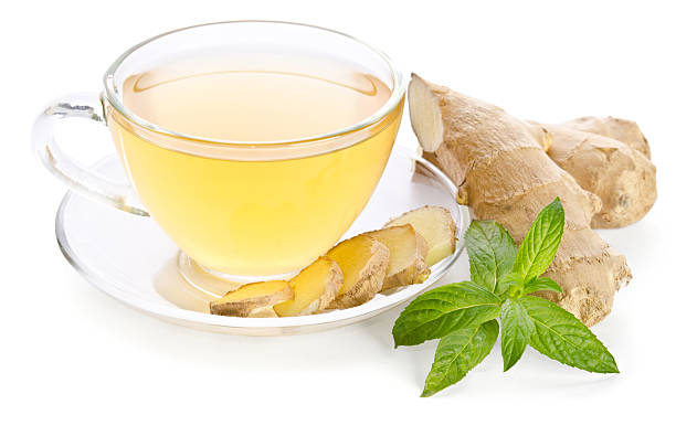 Tea with Ginger Root isolated on white background stock photo