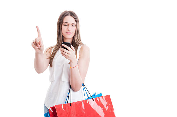 istock Wait a minute concept with young shopaholic reading something im 585070420