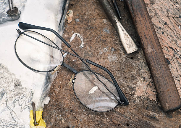 istock Vintage eyeglasses with set of hand tools 585071756