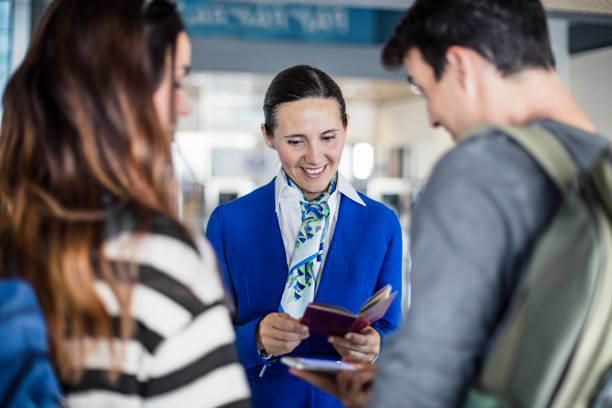 istock Couple boarding to plane showing smart phone ticket at gate 585072548