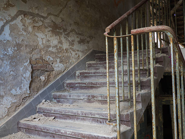istock Staircase in an abandoned house 585072636