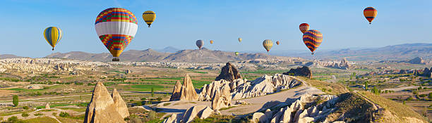 istock Hot air ballooning in Cappadocia, Turkey 585074020
