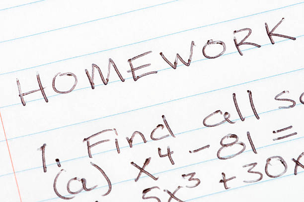 istock Homework questions on ruled paper 585075072