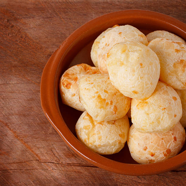 istock Brazilian snack cheese bread (pao de queijo) in bowl 585078768