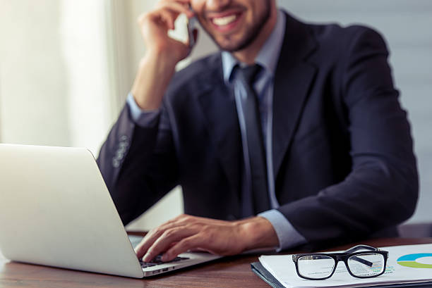 istock Handsome young businessman working 585079022