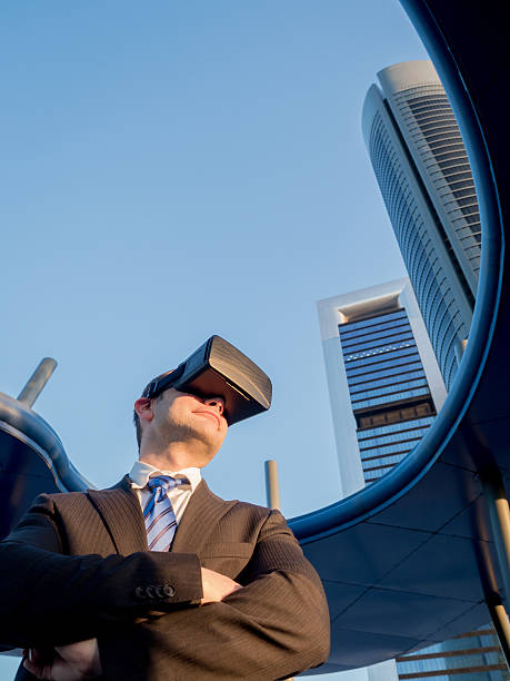 istock Confident businessman using virtual reality glasses in a business center 585079890