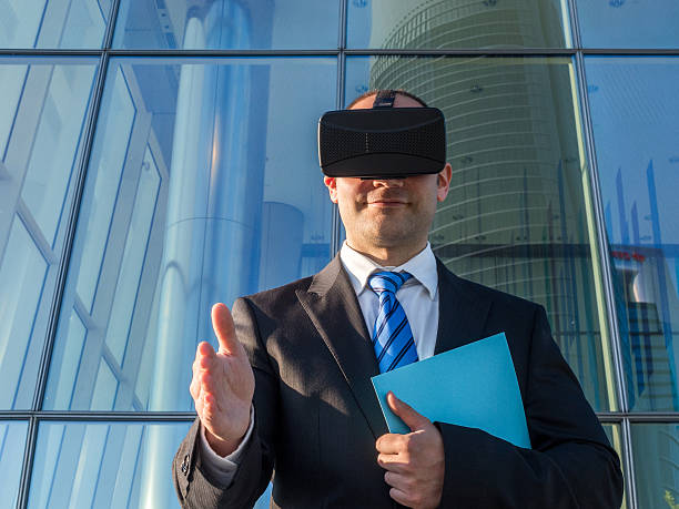 istock Businessman using virtual reality glasses for a meeting in cyberspace 585080050