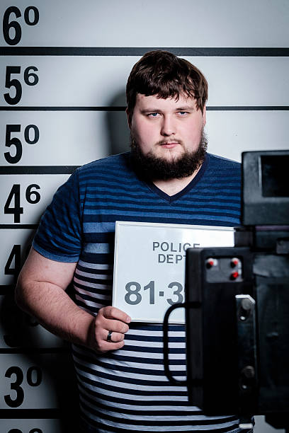 istock Mugshot of a Man 585080176