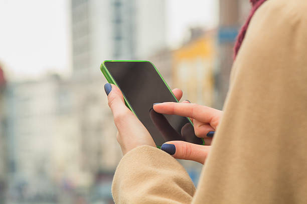 istock Urban girl using cellphone. 585081126