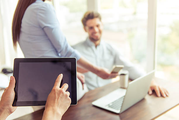 istock Beautiful business couple working 585082194