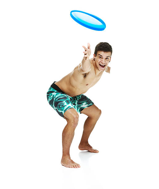 istock Shirtless muscular man throwing frisbee 585082982