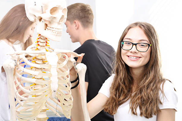 istock Teenagers on biology lesson 585085016