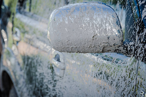 istock Mud splash on the car side after off road way 585086350