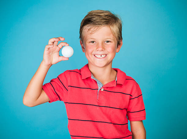 istock Six Year Old Junior Golfer Goofing Around 585087886