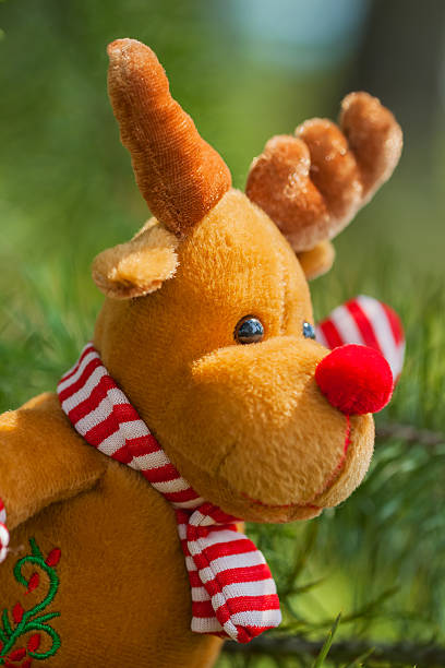 istock Christmas deer on fir branch for decoration 585089918