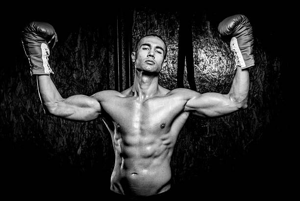 istock Young muscular man in gym 585090974