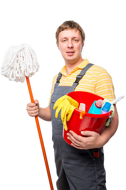 istock man servant house cleaning portrait on white background 585091982