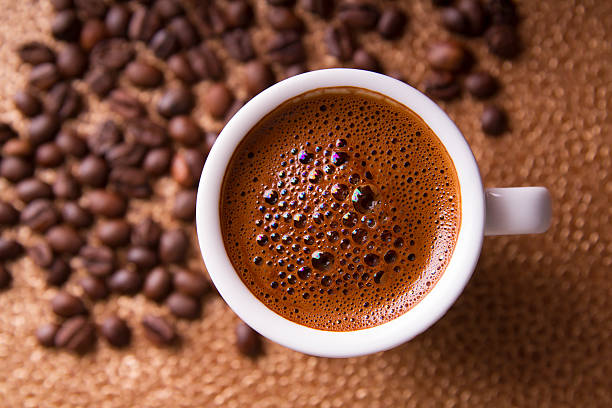 fresh black turkish coffee - close up - türk kahvesi stok fotoğraflar ve resimler