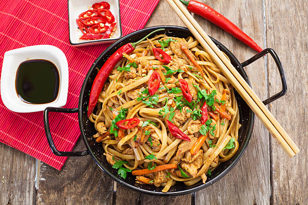 istock Chinese food on wok 585092224