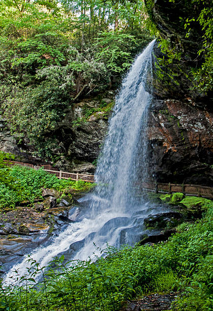 istock Dry Falls surrounded with green plants in summer. 585147438