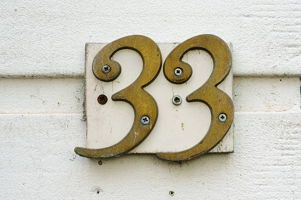 Number 33 Brass house number thirty three (33) number 33 stock pictures, royalty-free photos & images