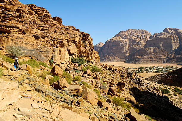 istock Tourist hiking in Wadi Rum, Jordan 585152946